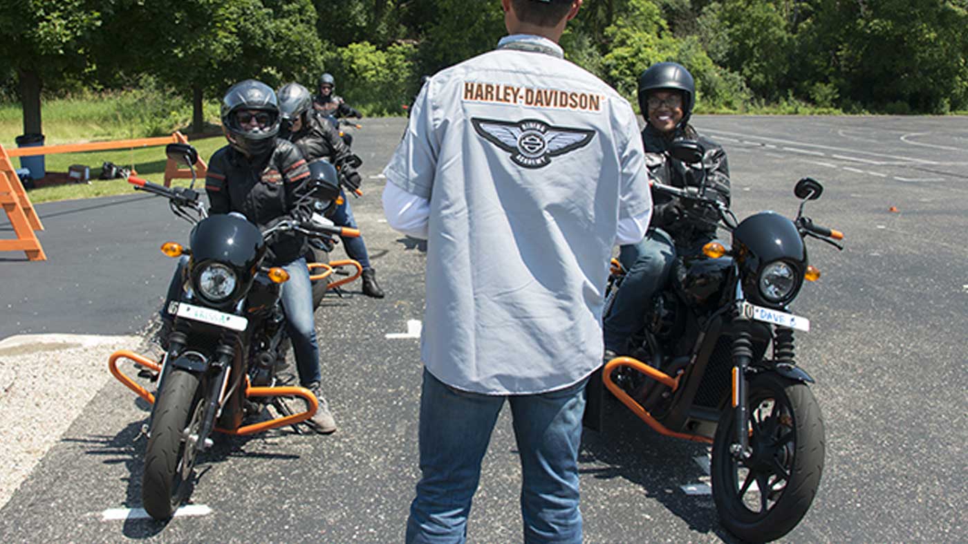 People on motorcycles lined up