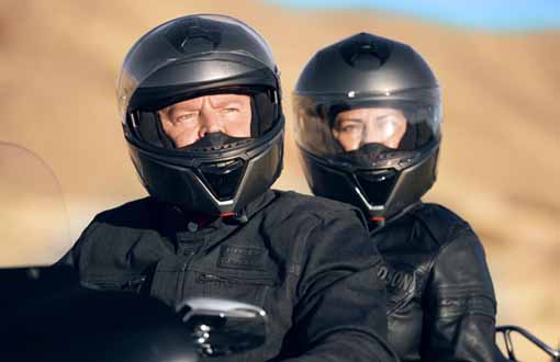 two riders in helmets