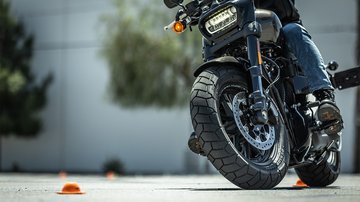 Motorcycle rider leaning through course