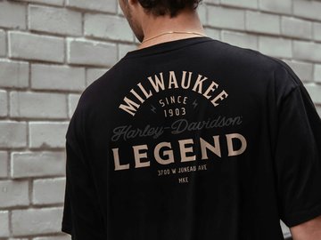 Man wearing h-d t-shirt showing back of t-shirt