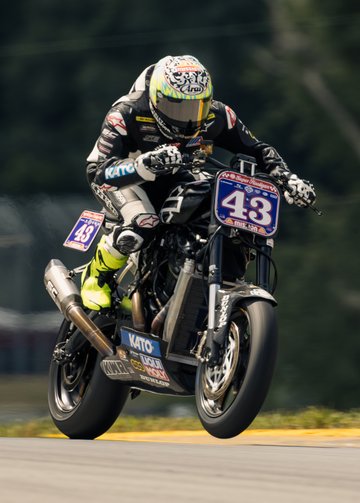close-up head-on-shot of james rispoli racing