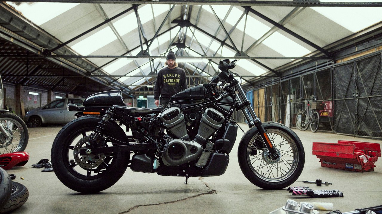 Charlie Stockwell with their customized motorcycle