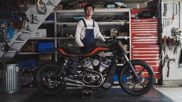 Hideya Togashi with their customized motorcycle