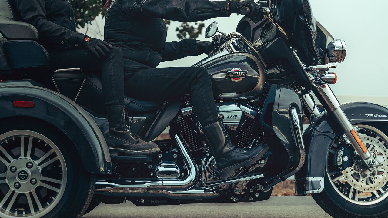 Tri Glide Ultra motorcycle close-up with two riders