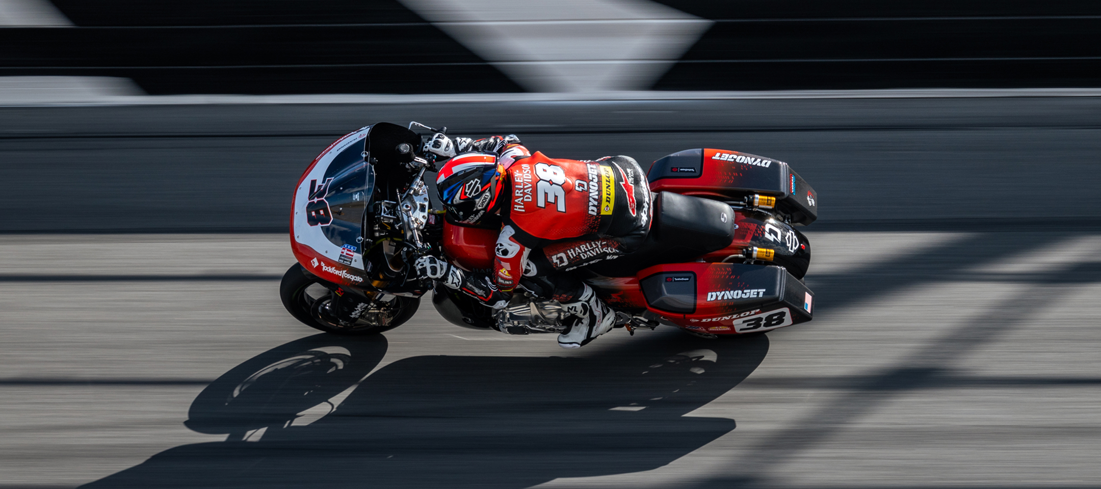 Number 38 Bradley Smith takes the bank at Daytona International Speedway at full speed during a King of the Baggers race