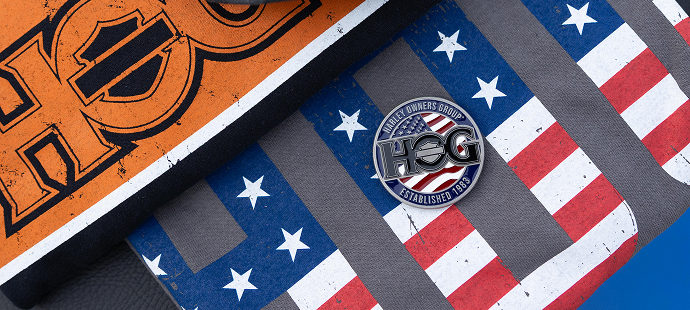 HOG branded merchandise including a coin with an American flag motif and the HOG logo