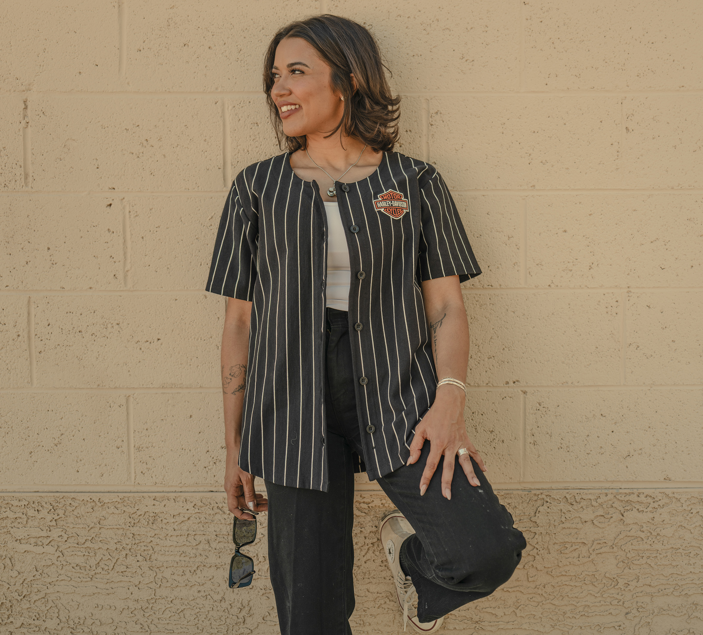 woman wearing black H-D jacket