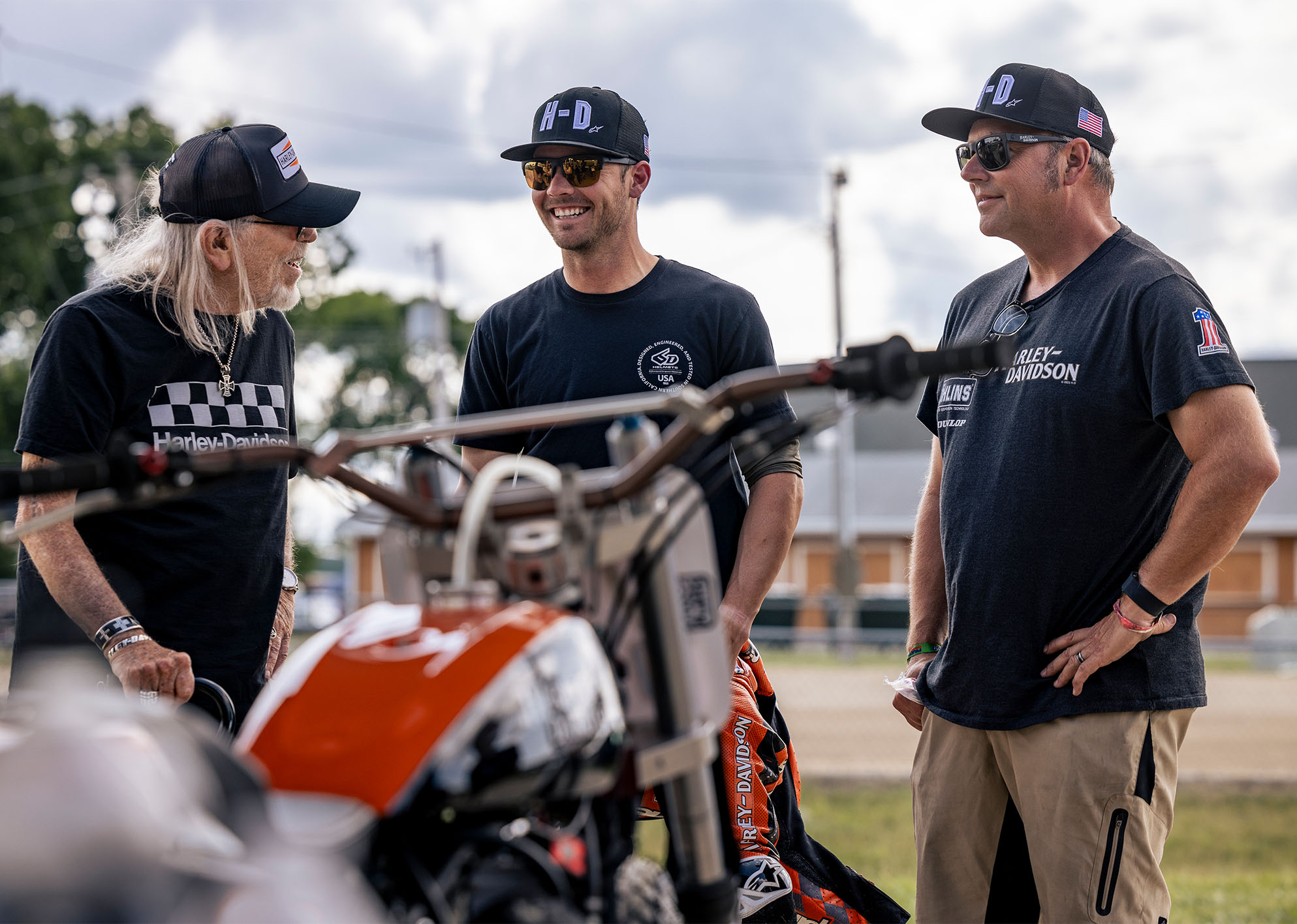 Kyle Wyman, Willie G., and Wes Orloff having a conversation
