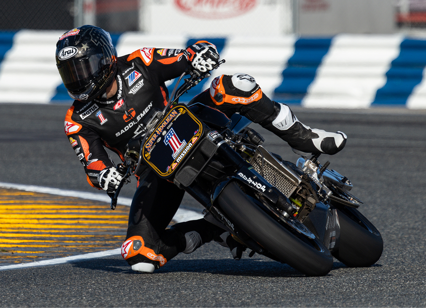 James Rispoli leans through a corner during a Super Hooligan race at Daytona International Speedway