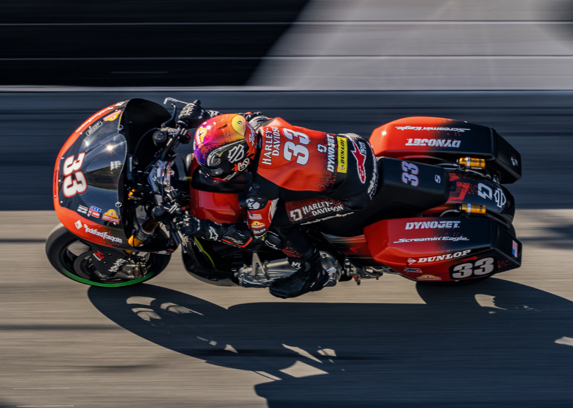 Number 33 Kyle Wyman at high speed on the banks at Daytona Raceway.