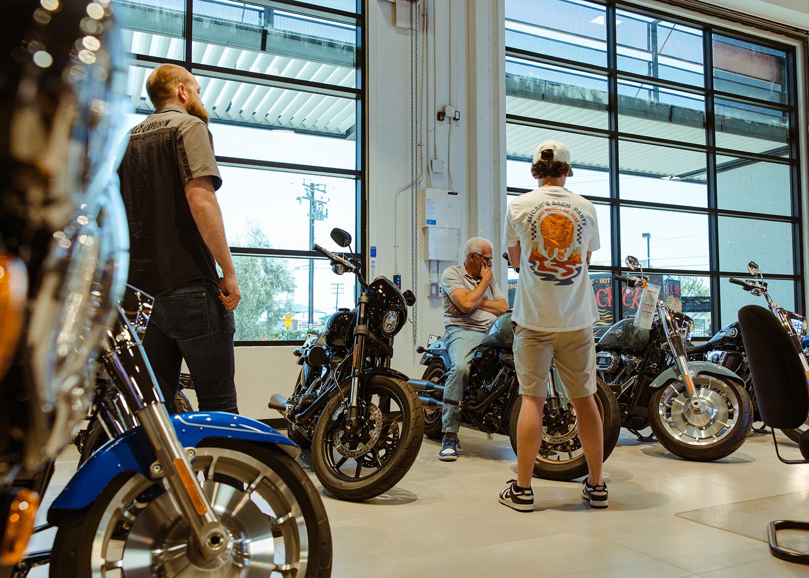 Laidlaw’s staff helping customers decide on a motorcycle.