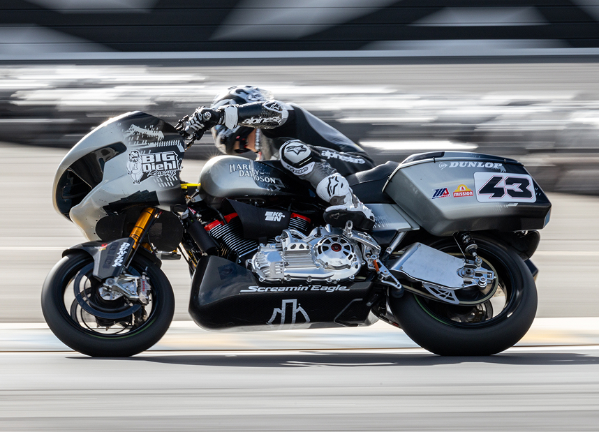 James Rispoli seen from the side moving at high speed during a King of the Baggers race