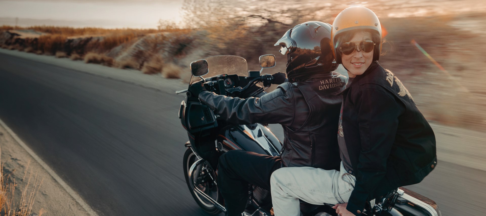two riders on moto riding shot