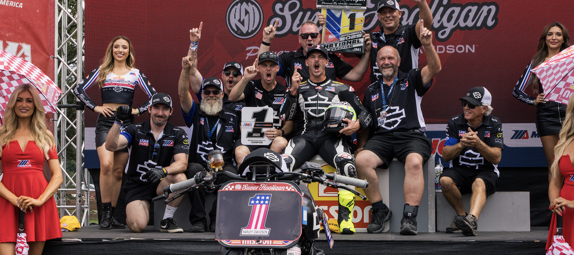 James Rispoli celebrates with his Harley-Davidson team on the podium.