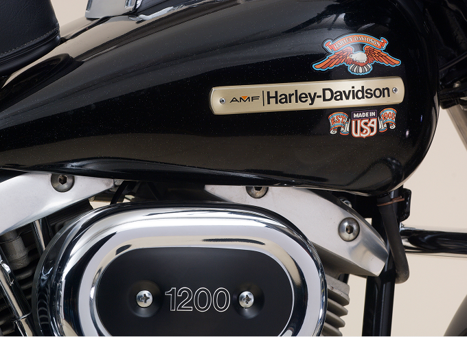 Detail shot of the tank graphic and air filter on a Harley-Davidson bicentennial Liberty Edition motorcycle