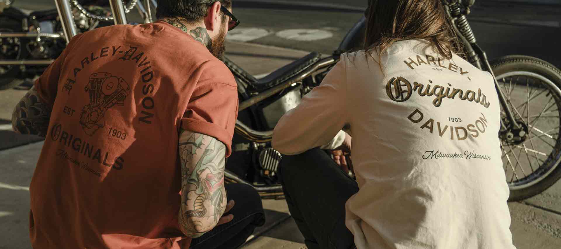 two men working on a bike