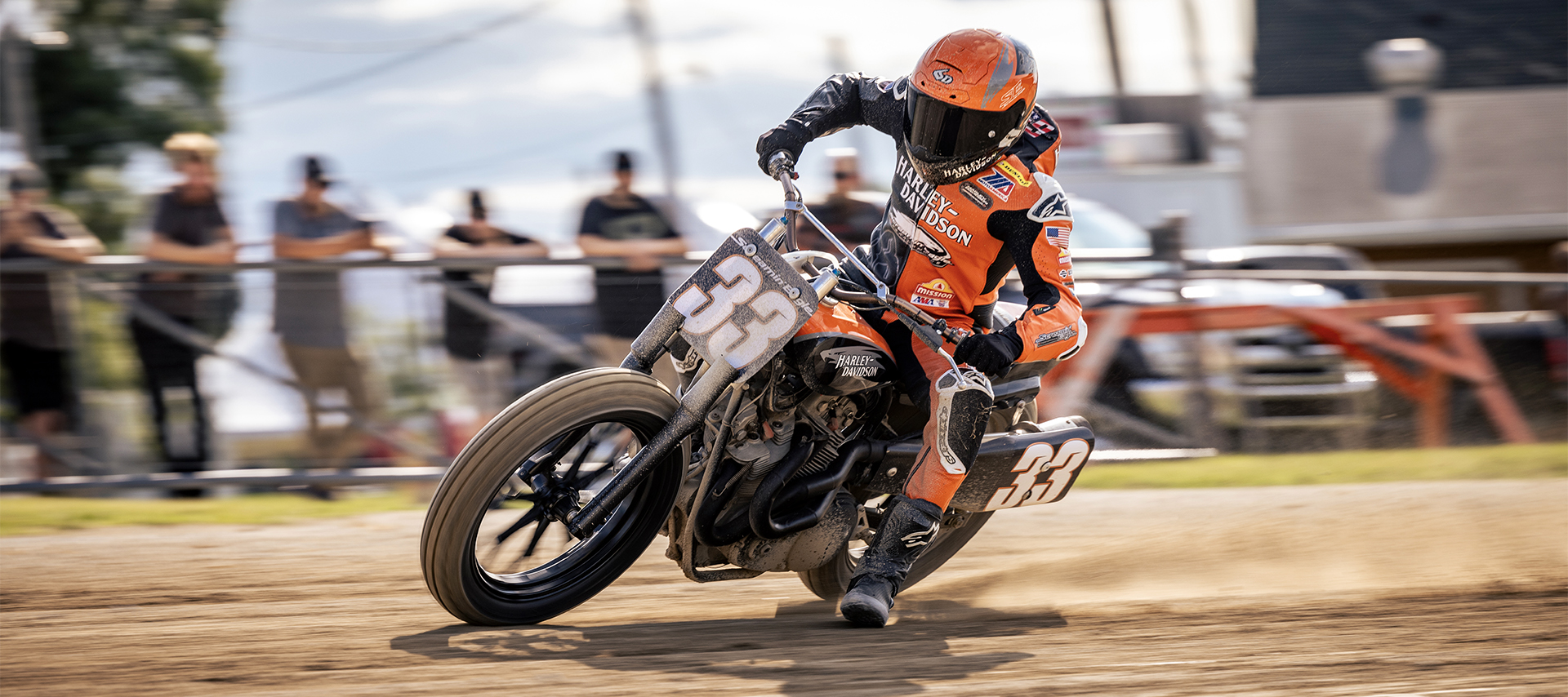 Kyle Wyman rides sideways on a dirt flat track
