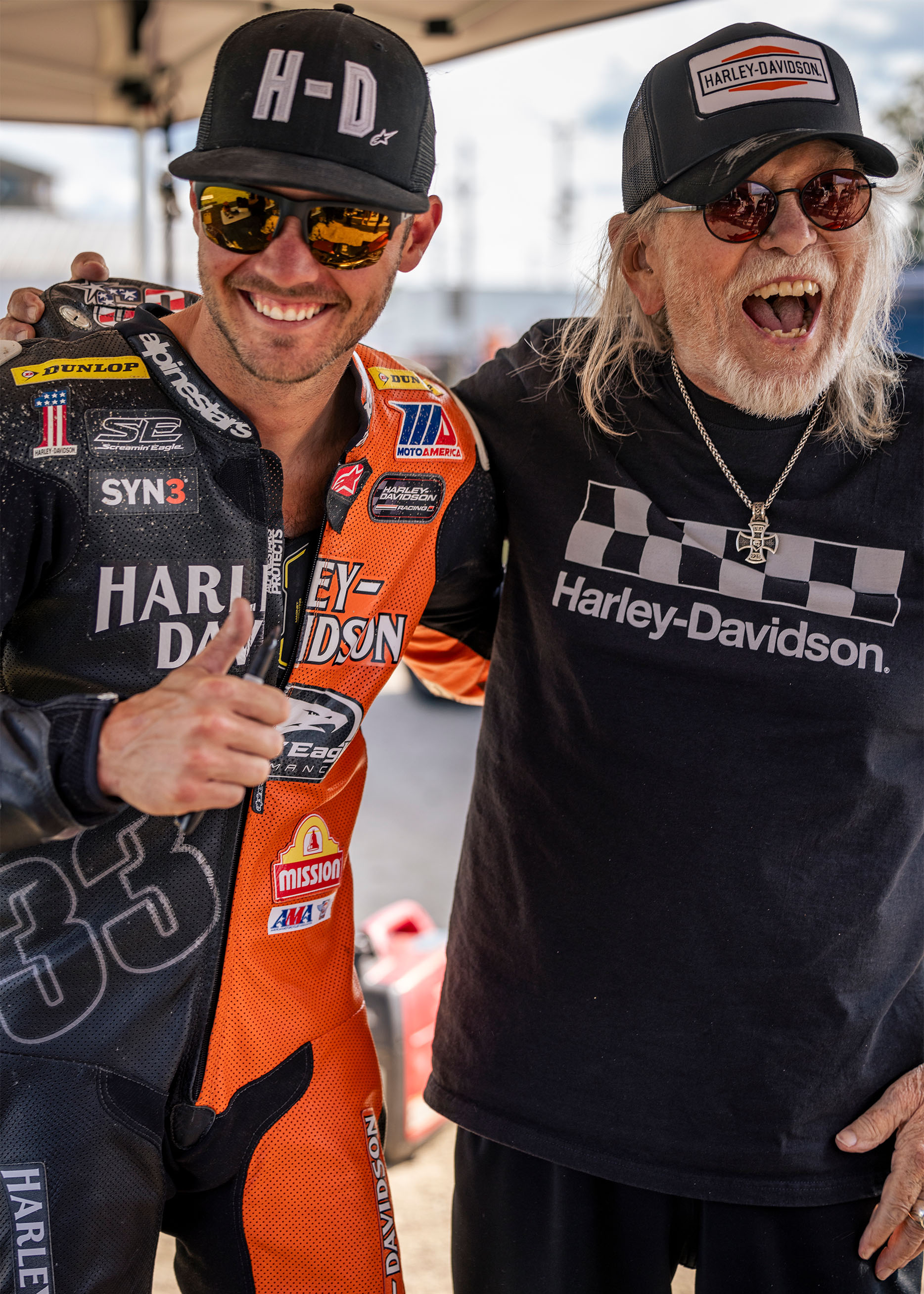 Kyle Wyman and Willie G embrace