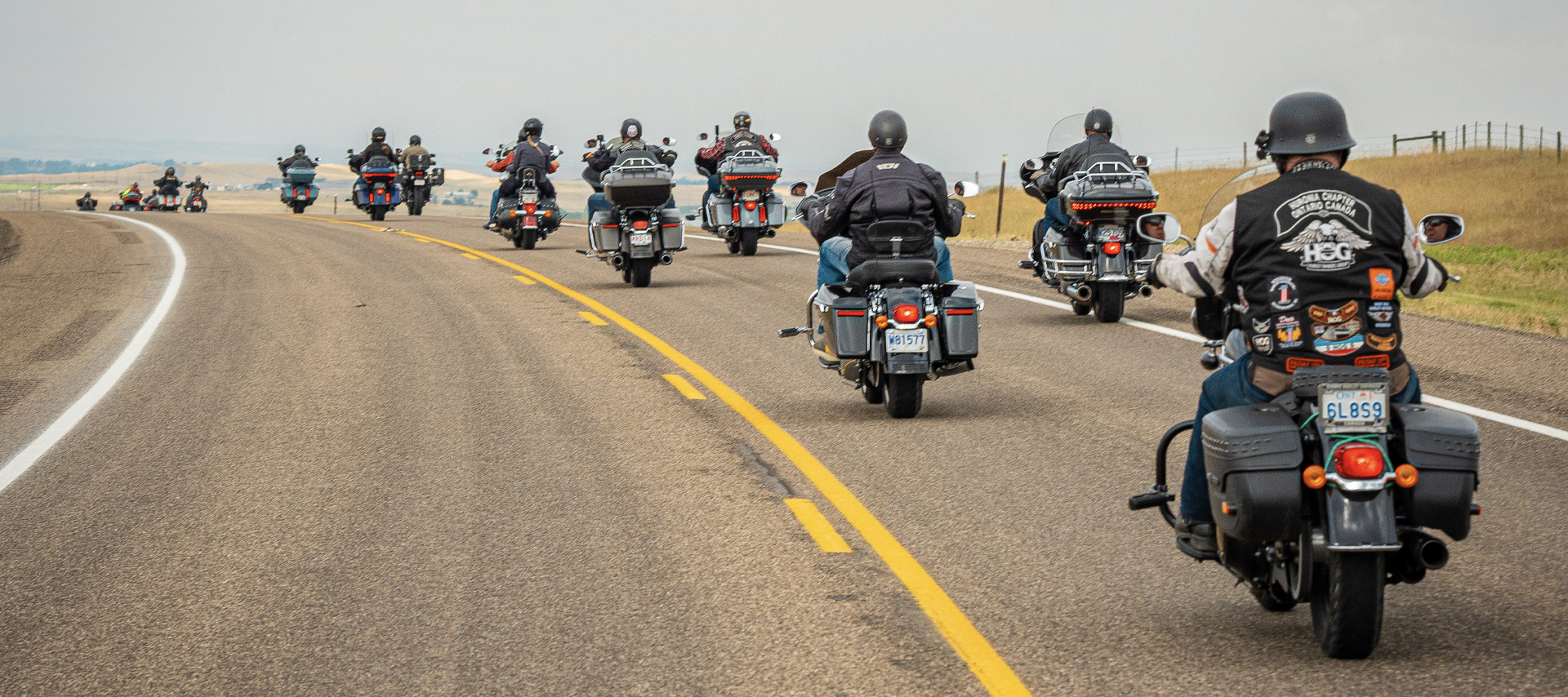 A long line of HOG members ride through the Black Hills 