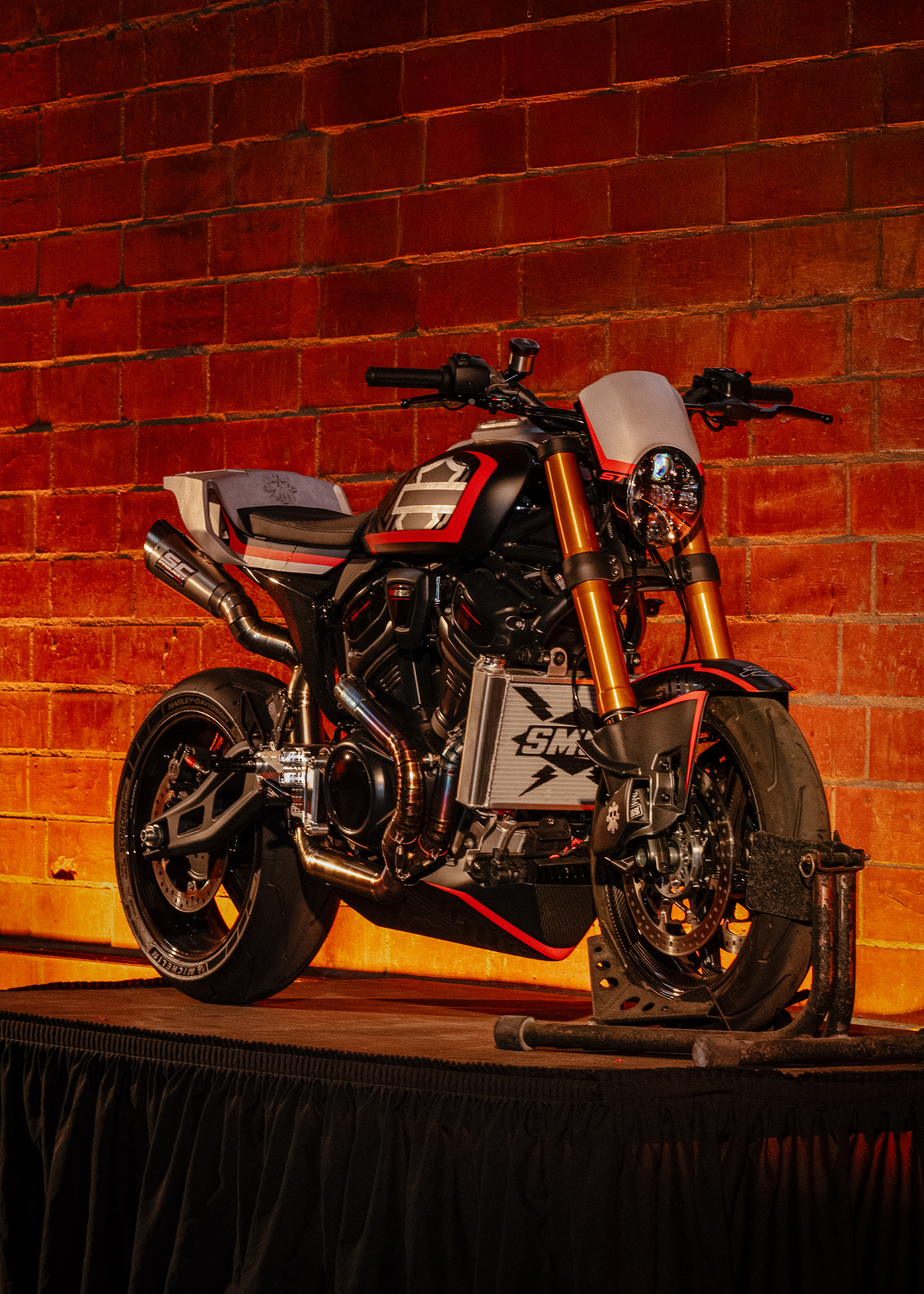 SMCO’s custom Harley-Davidson Pan America ST seen from a front 3/4 view on display during the Harley-Davidson Fight Night event.