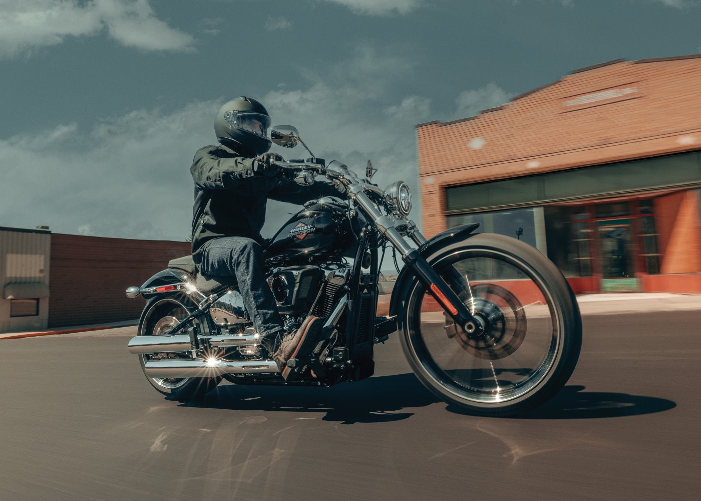 2025 Breakout riding down small town main street