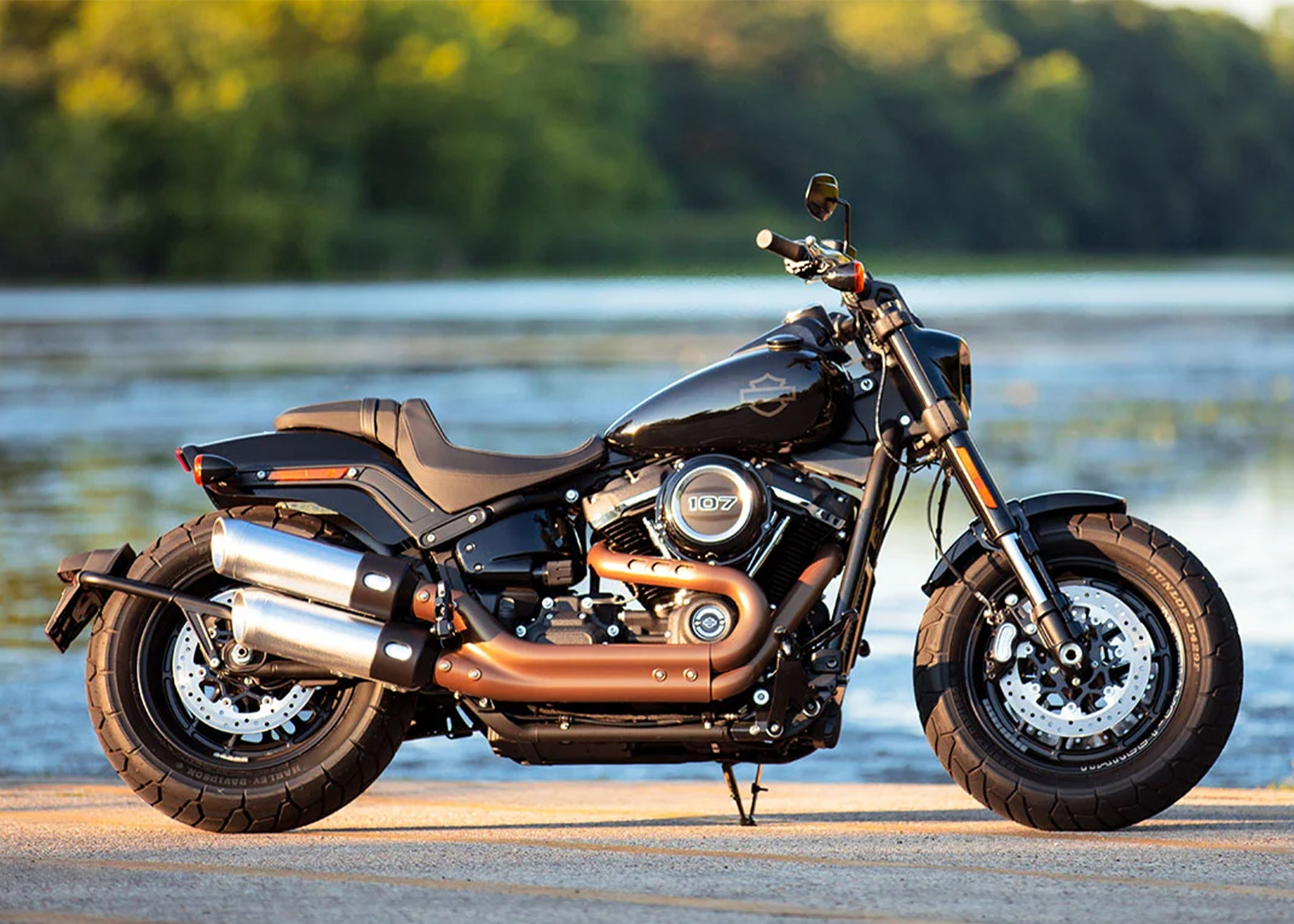 Bike parked on cement near water