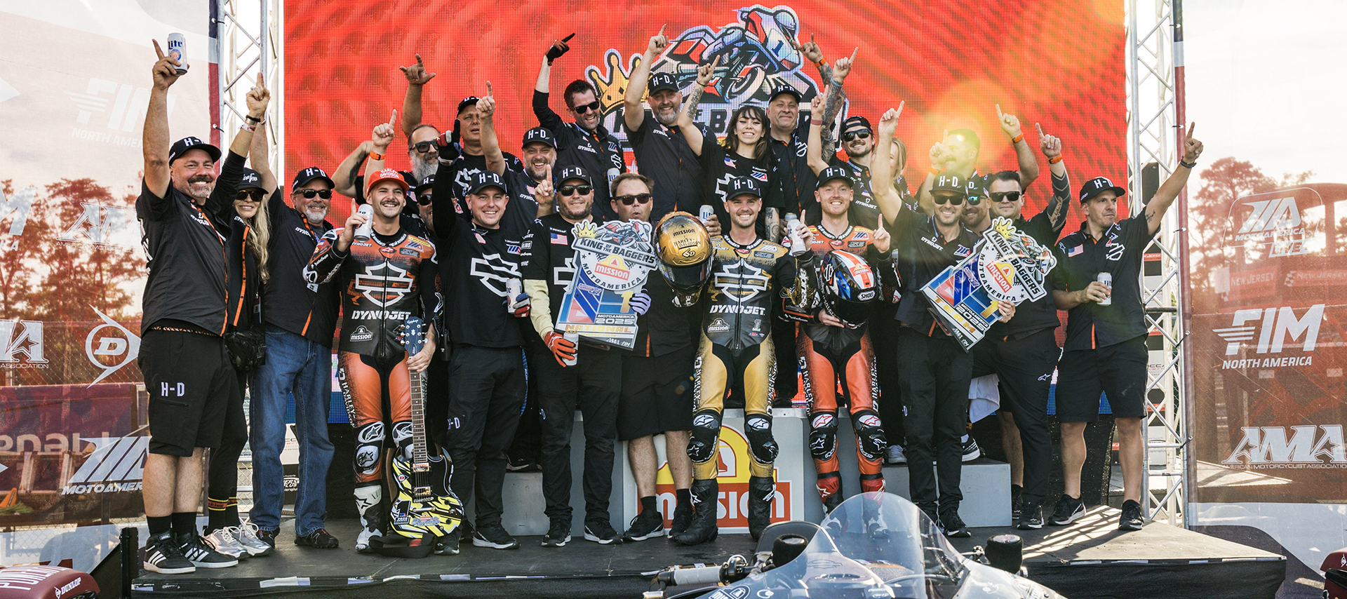 The Harley-Davidson Factory Racing team celebrates atop the podium at the end of the King of the Baggers race season.