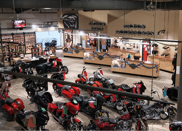 Looking down at motorcycles, parts, and accessories on the showroom floor of Harley-Davidson of Madison