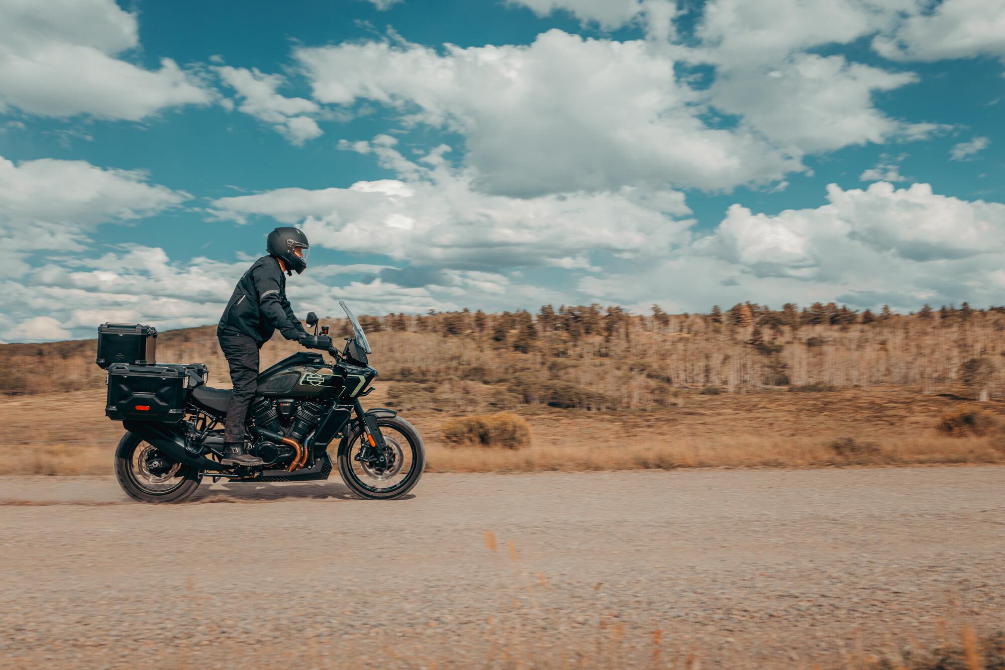 Motorcyclist rides a Pan America Limited on backroads 