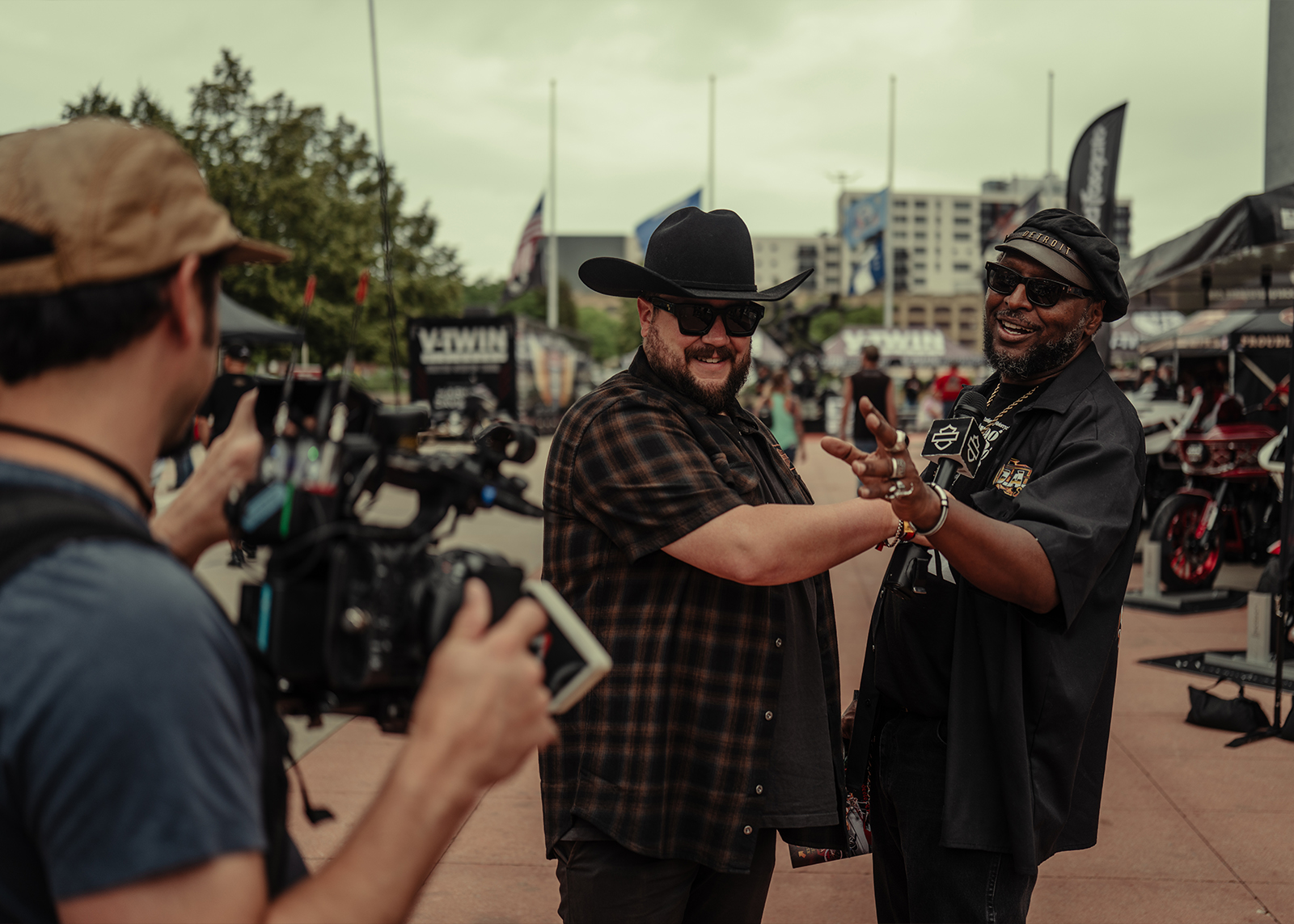 Harley-Davidson ambassador Detroit jokes with a friend