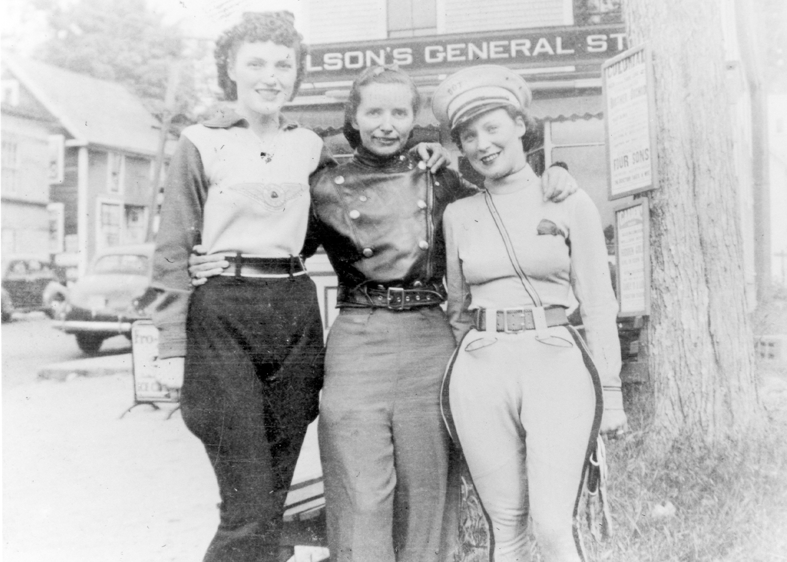 A vintage black and white photo of Motor Maid Dot Smith with club co-founders Linda Dugeau and Dot Robinson, about 1940.