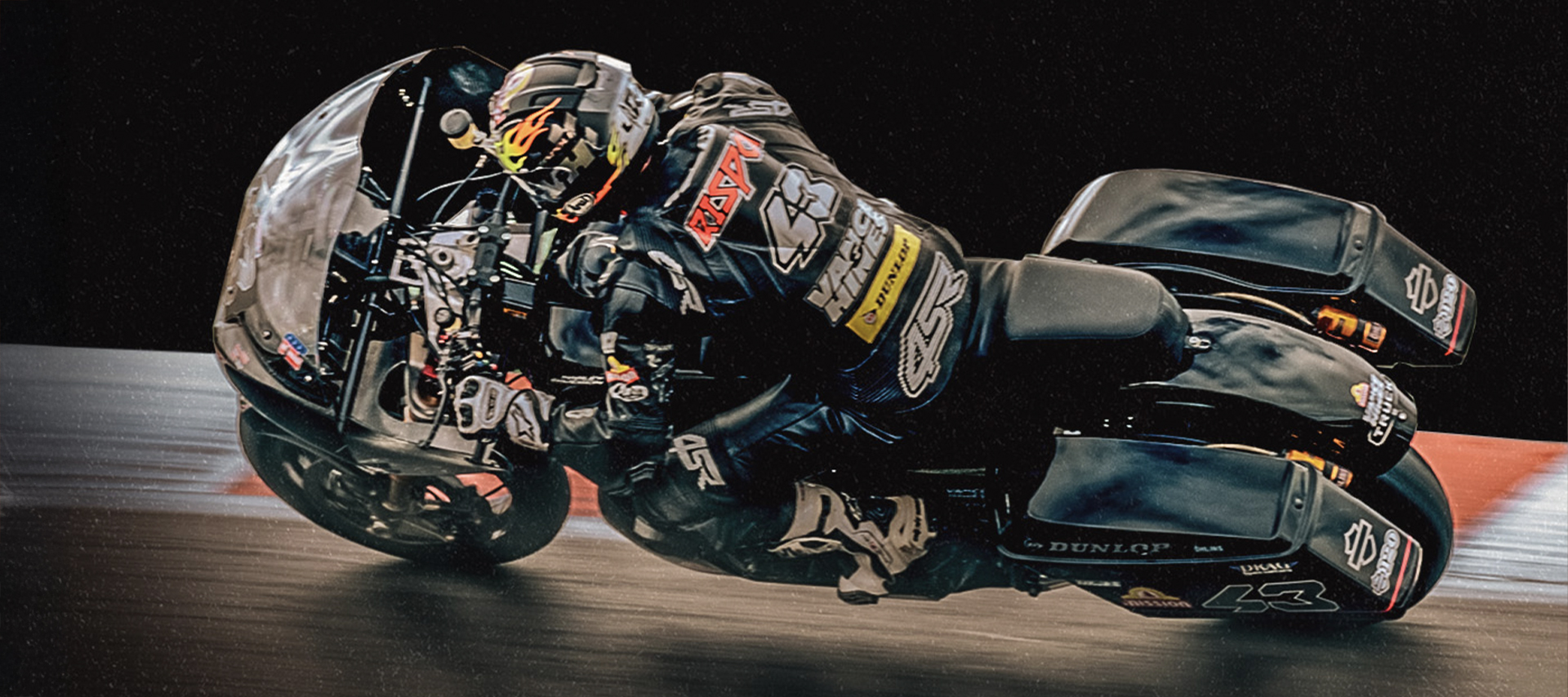 James Rispoli rides fast on his Vance & Hines bagger 