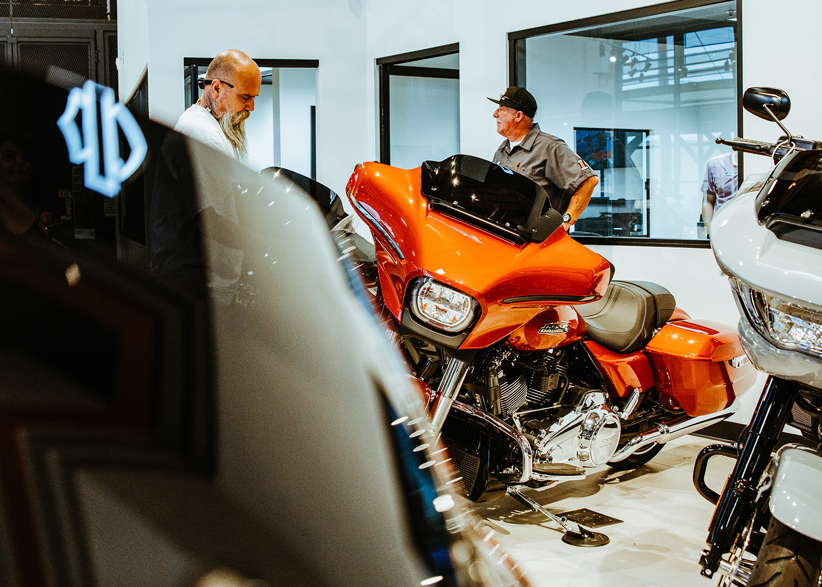 Customers shopping in Laidlaw’s Harley-Davidson showroom.