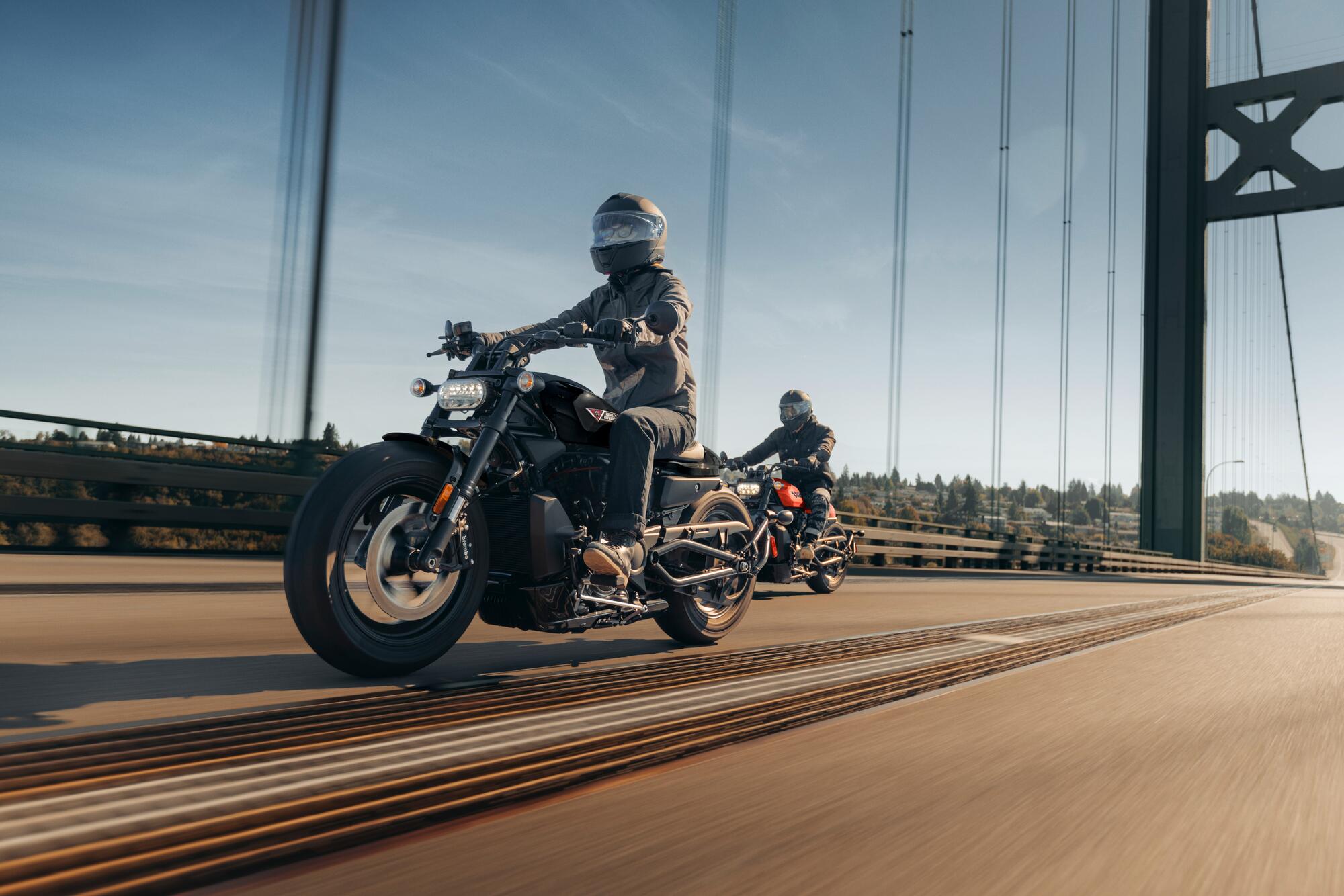 Motorcyclist rides Sportster S across a bridge 