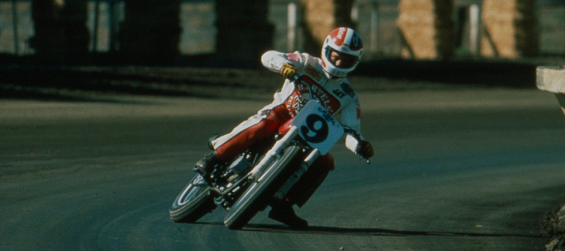 Jay Springsteen slides his Harley-Davidson around a turn during a flat track race