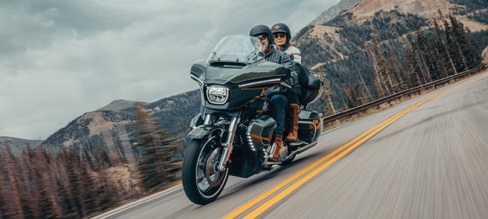 Man and woman riding a Street Glide Limited