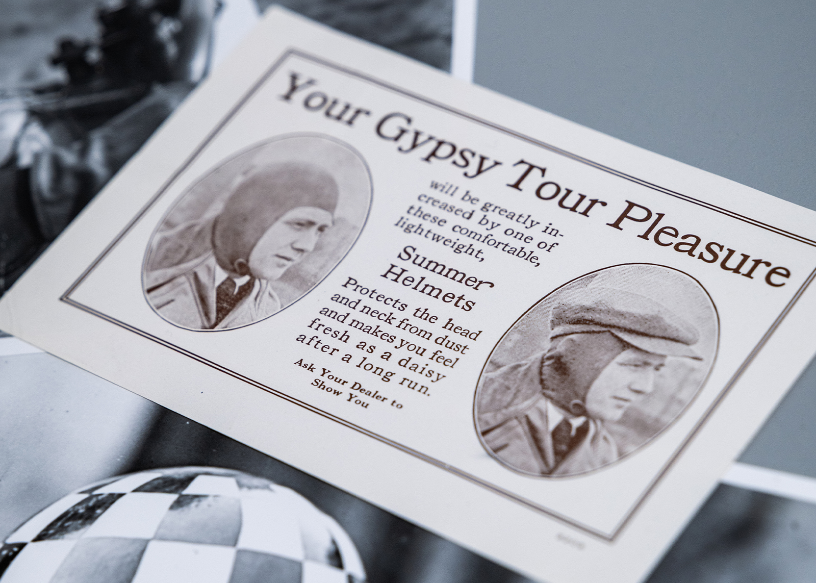 A photo of an ad from the 1910s for Harley-Davidson summer helmets with the headline “Your gypsy tour pleasure”.