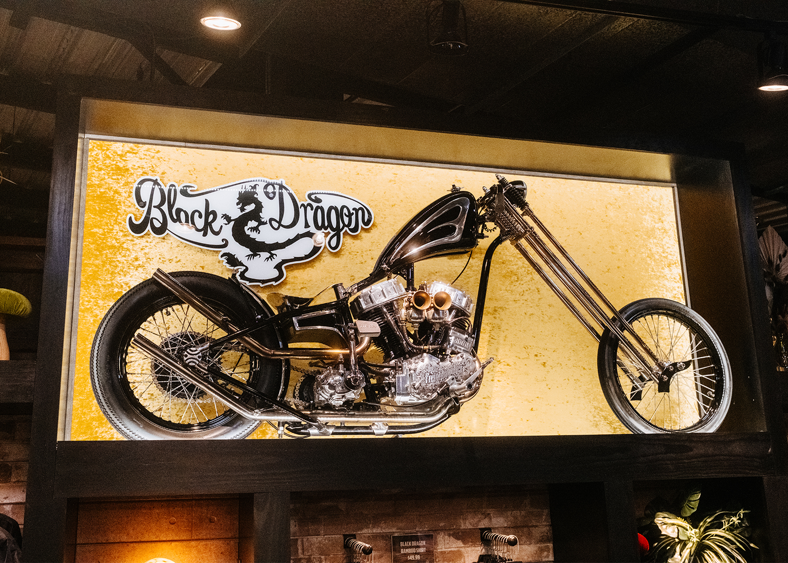 Custom Black Dragon chopper on display.