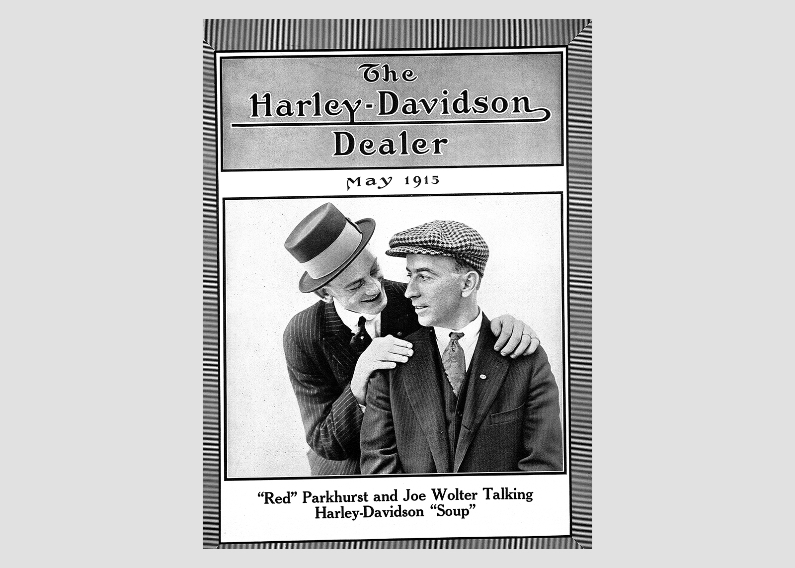 The cover of the May 1915 issue of Harley-Davidson Dealer showing Leslie “Red” Parkhurst and Joe Wolter talking about Harley-Davidson.