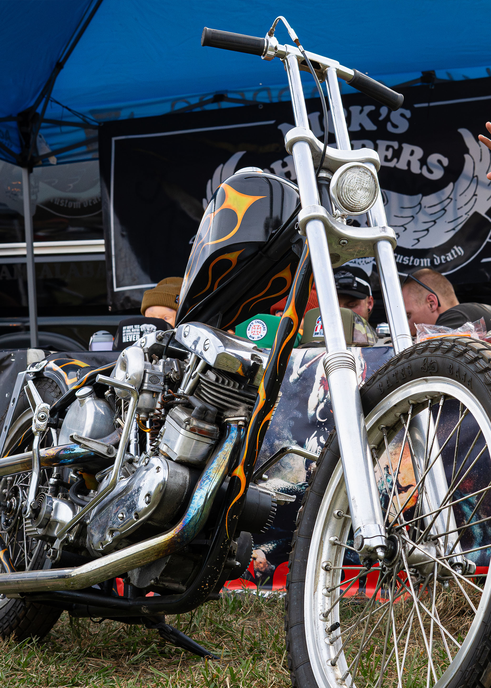 Close up of black Harley with orange flames