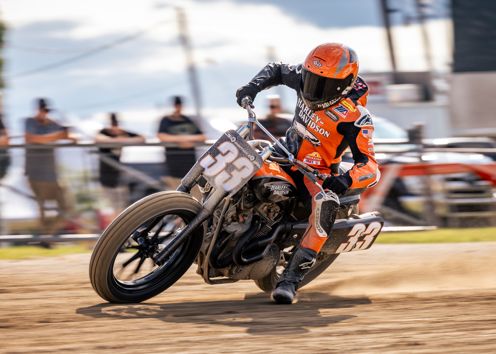 Kyle Wyman rides sideways on a dirt flat track