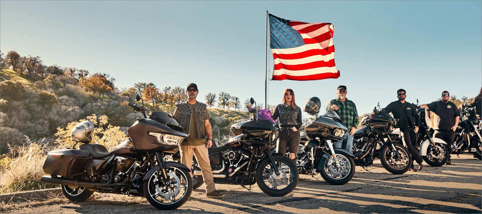 riders-near-motorcycles-american-flag-shd