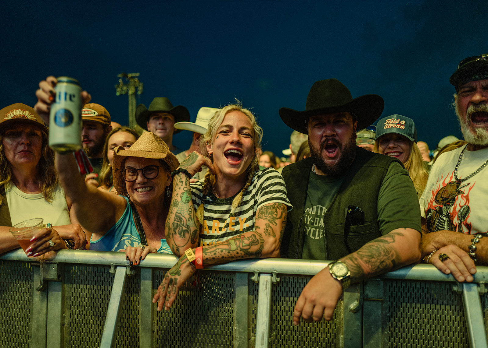 Cheering fans front row at a concert