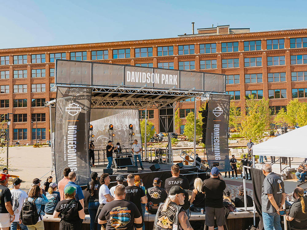 Outdoor concert stage at Davidson Park with crowd in front