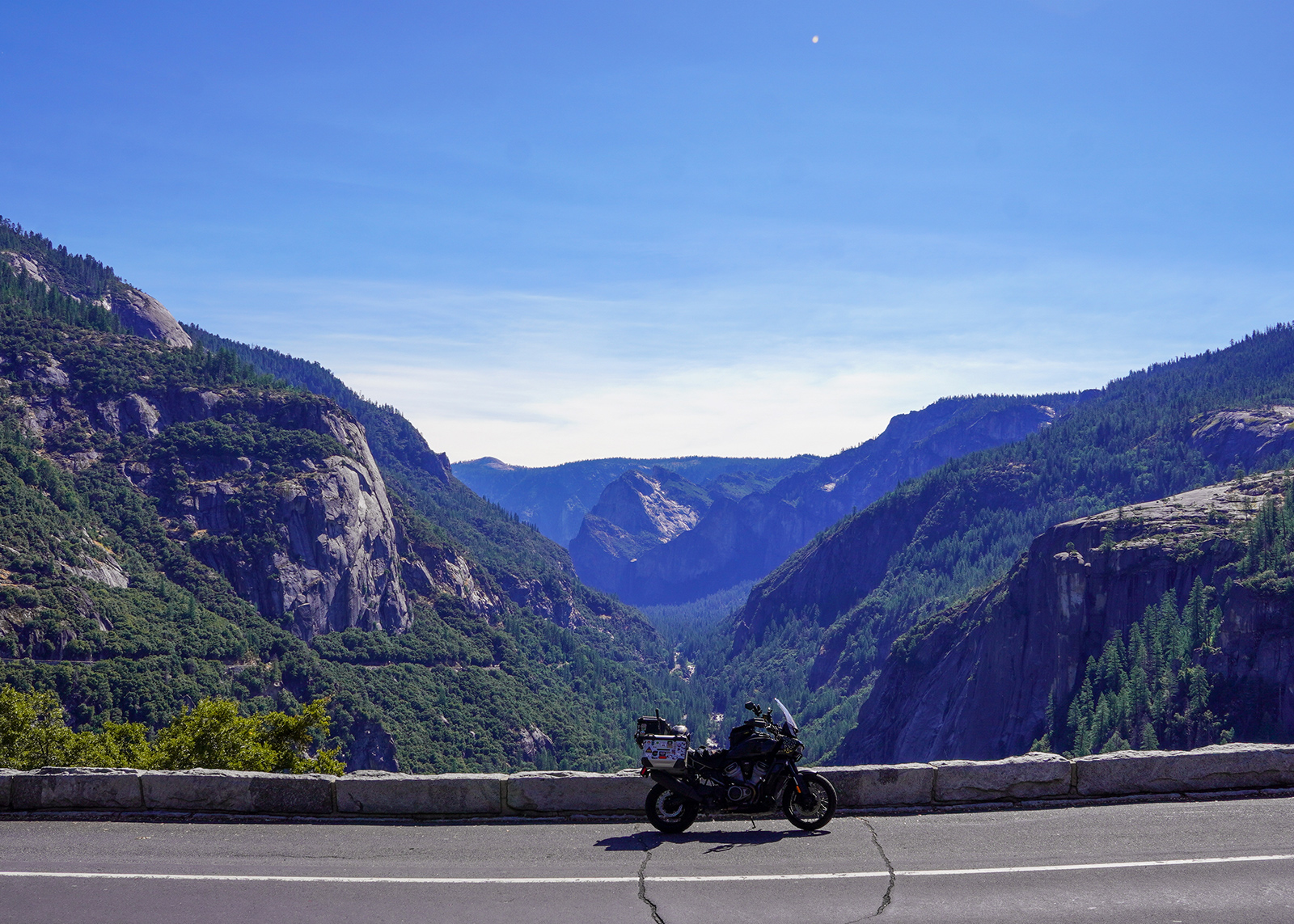 The author Sanna Bomans Harley-Davidson Pan America at a roadside viewpoint in Yosemite National Park.