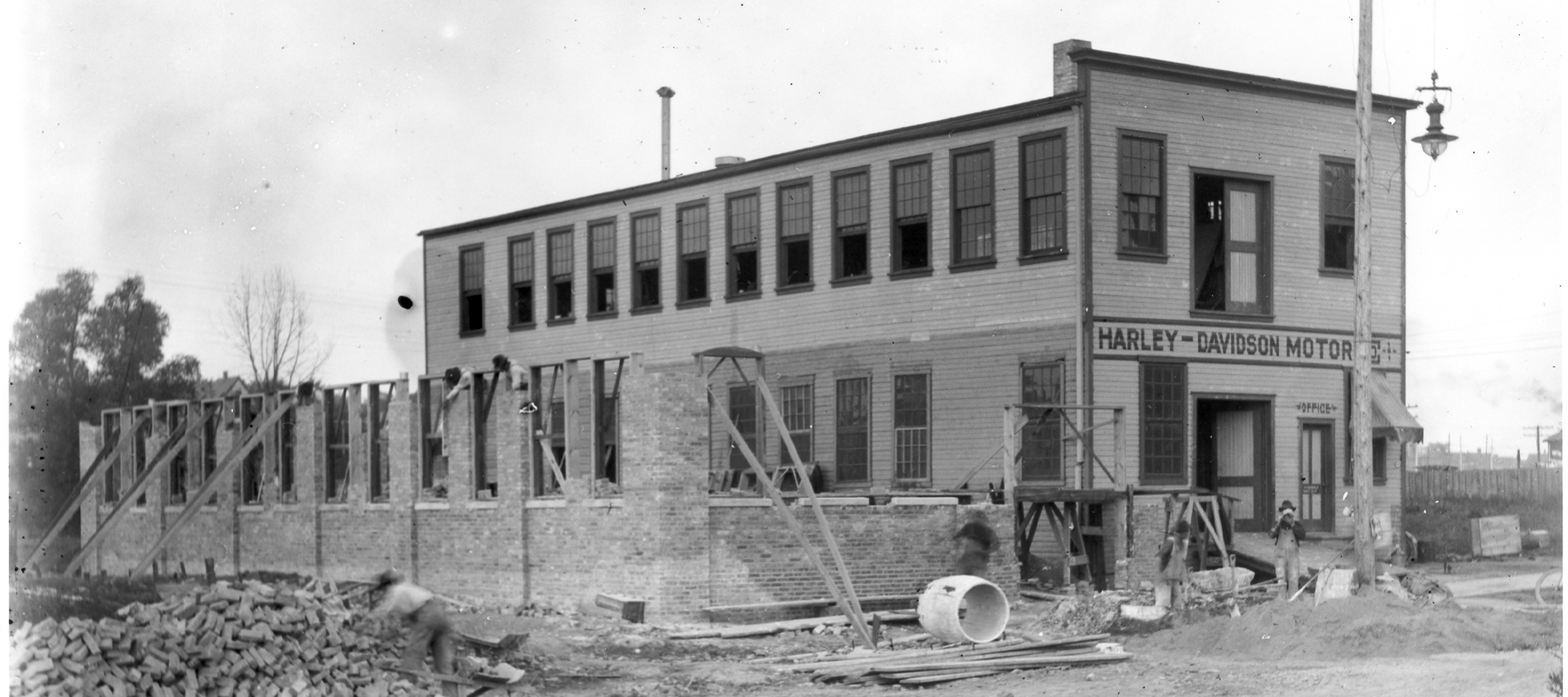 A two-storey brick building under construction