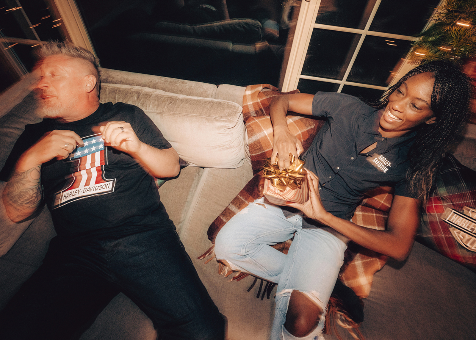 Man and Woman Opening Presents