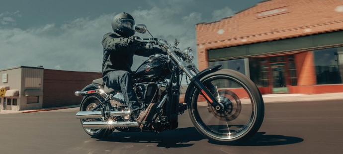 2025 Breakout riding down small town main street