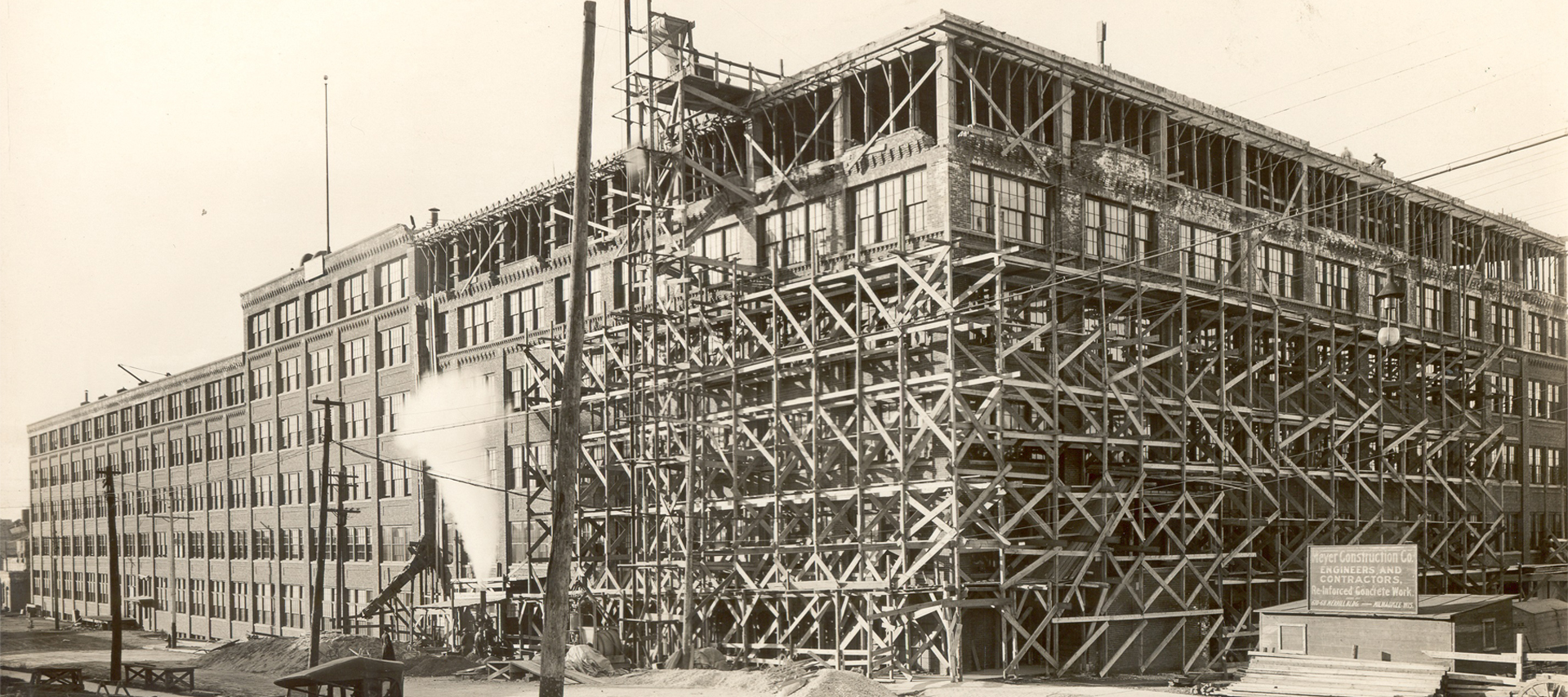 A large brick building under construction