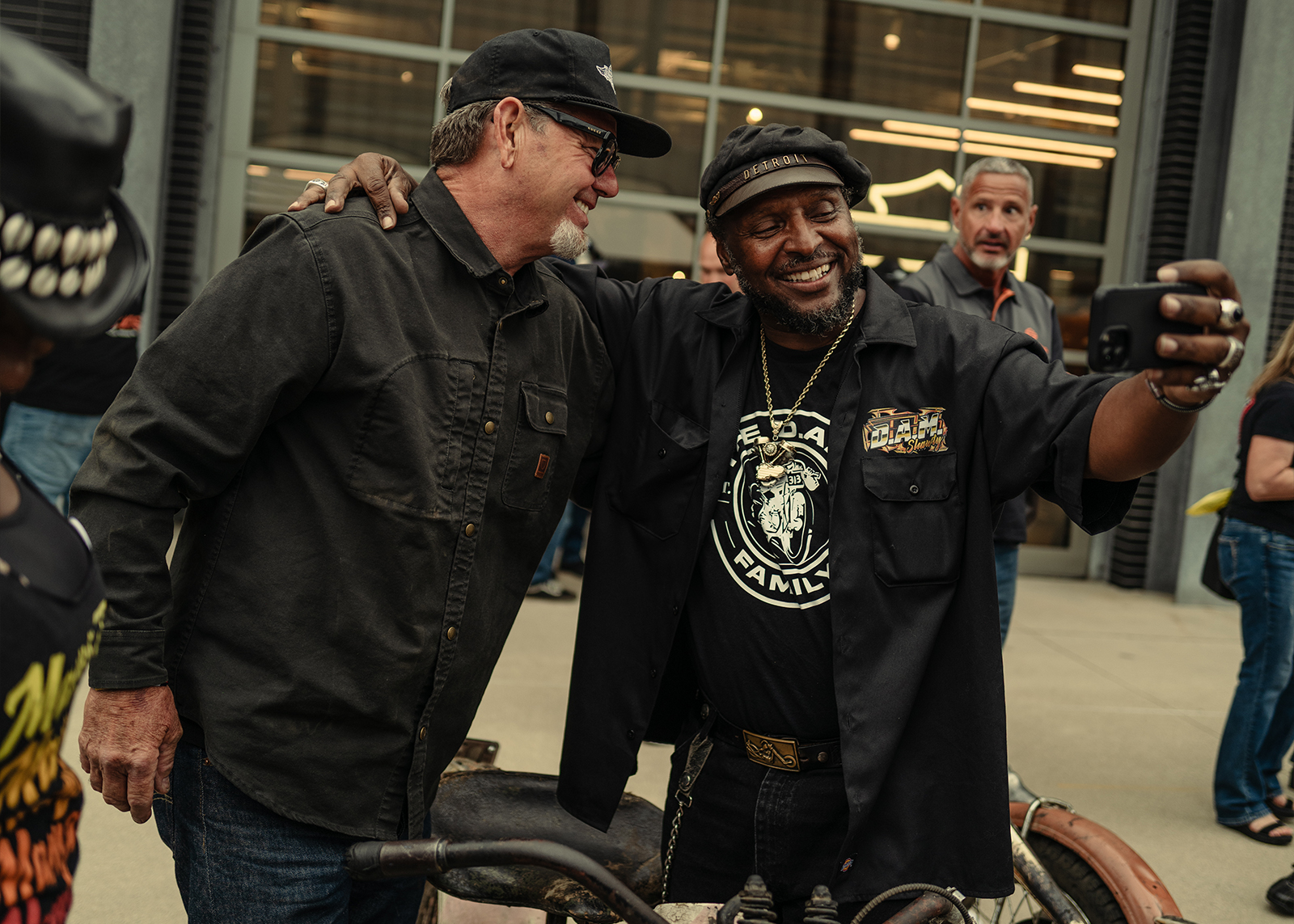 Harley-Davidson ambassador Detroit takes a selfie with a friend
